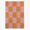Binnen tapijt oranje en roze dambordpatroon