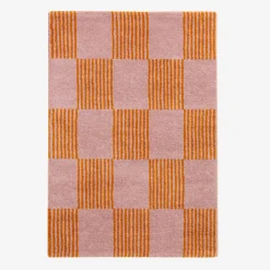 Binnen tapijt oranje en roze dambordpatroon