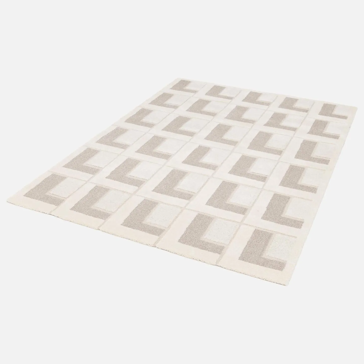 Crèmekleurig vloerkleed met geometrische patronen