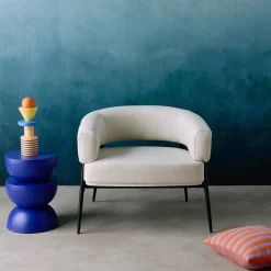 Fauteuil stof gebogen rugleuning metalen frame
