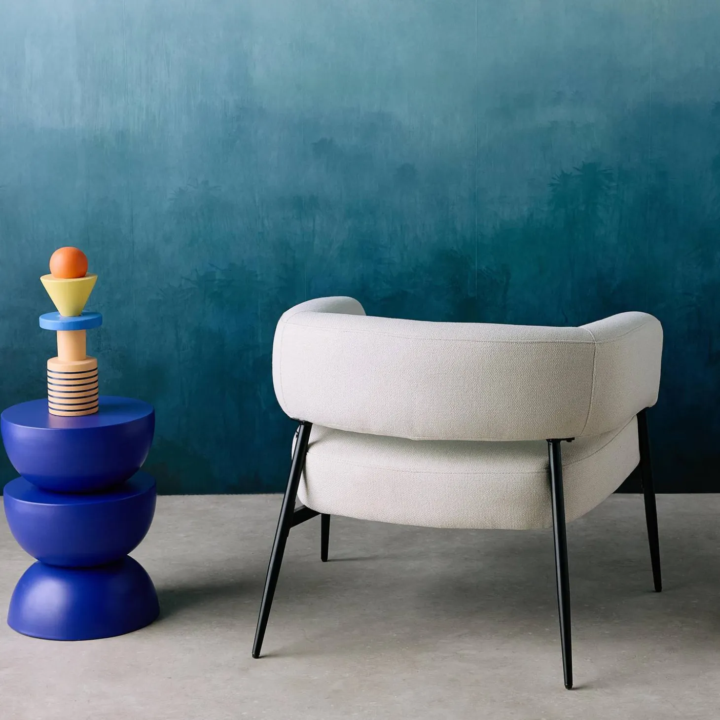 Fauteuil stof gebogen rugleuning metalen frame