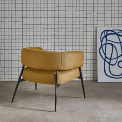 Fauteuil stof gebogen rugleuning metalen frame