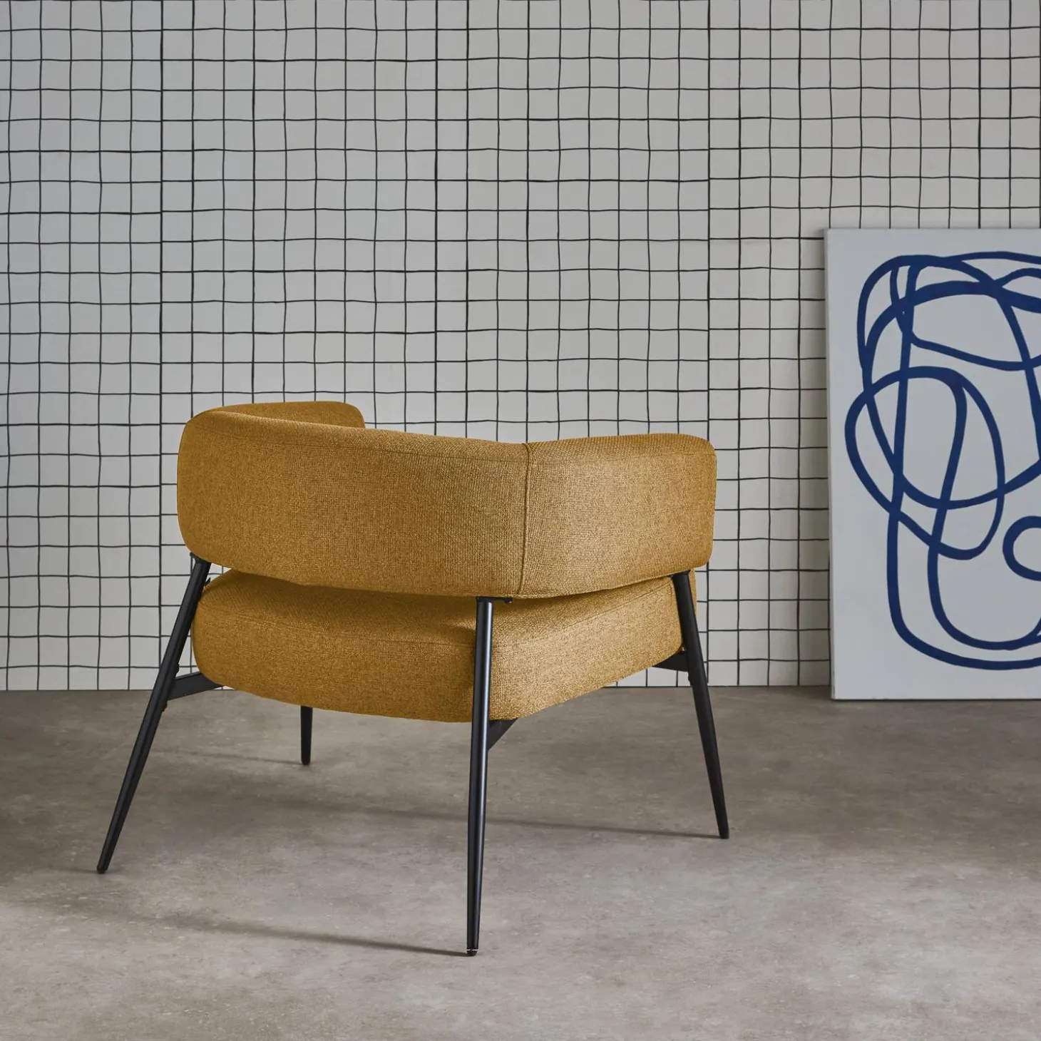 Fauteuil stof gebogen rugleuning metalen frame