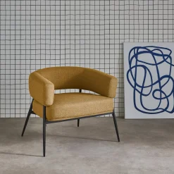 Fauteuil stof gebogen rugleuning metalen frame