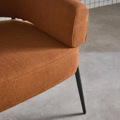 Fauteuil stof gebogen rugleuning metalen frame