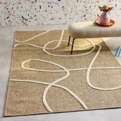 Interieurtapijt met jute-effect, reliëf grafisch patroon in wit.