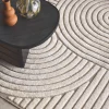 Interieur vloerkleed met bogen crème en beige