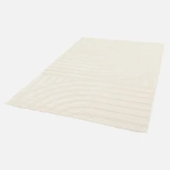 Interieur vloerkleed met crème bogen