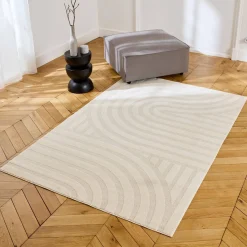 Interieur vloerkleed met crème bogen