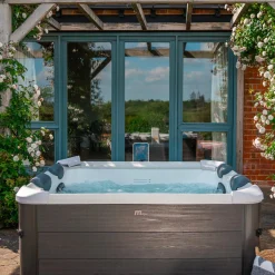 6-persoons vaste spa 180cm grijs hydromassages 4 kussens 8 filters afdekzeil