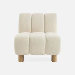 Relaxfauteuil met afgeronde poten in hout en boucléstof