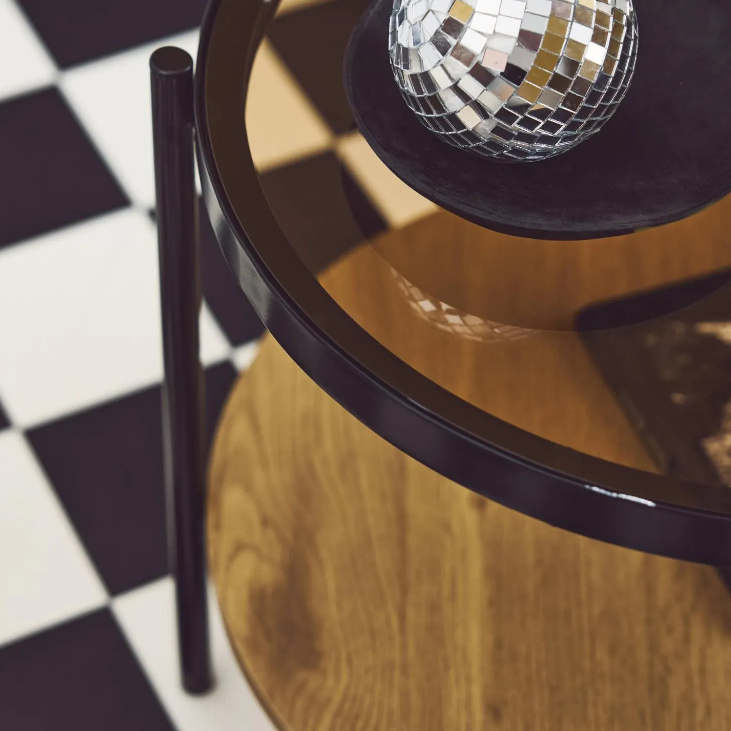 Ronde bijzettafel in gehard glas, hout- en metaaleffect zwart