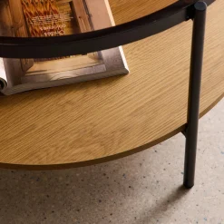 Ronde salontafel met dubbel blad en een materiaalmix