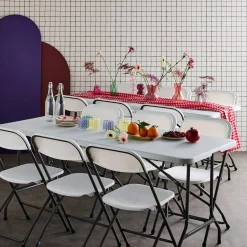 Set van 2 opvouwbare plastic receptietafels + 12 stoelen