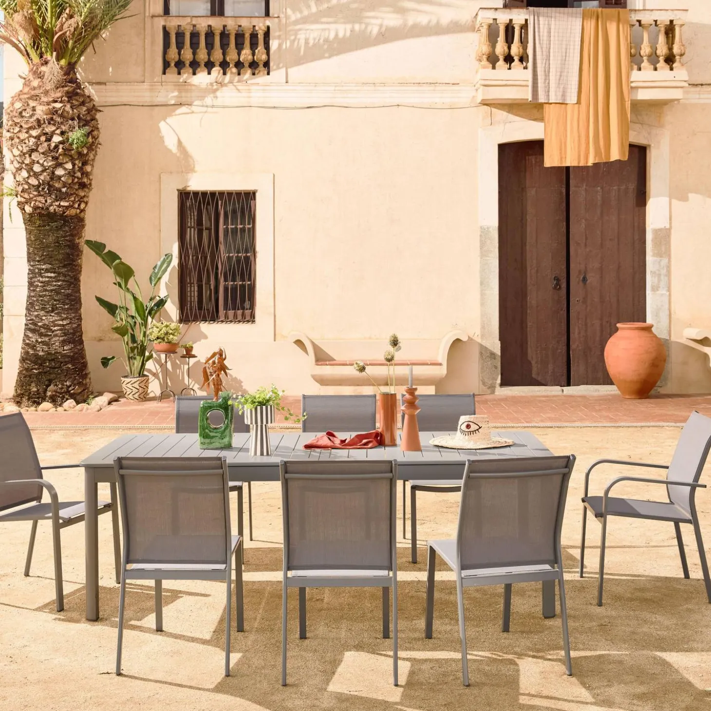 Uitschuifbare tuintafel van aluminium en textileen, 10 stoelen