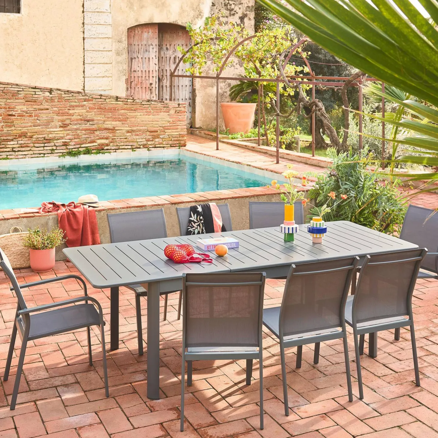 Uitschuifbare tuintafel van aluminium en textileen, 8 stoelen