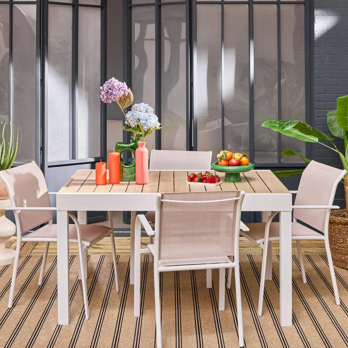 Verlengbare tuintafel met 8 stoelen van aluminium en textileen