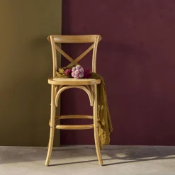 Vintage rubberhouten bistro barkruk met voetensteun