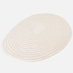 Vloerkleed in de vorm van een kiezelsteen met crèmekleurig cirkelpatroon voor binnen
