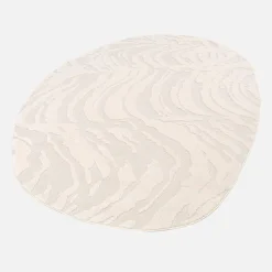 Vloerkleed in kiezelvorm met crèmekleurig reliëfpatroon voor binnen